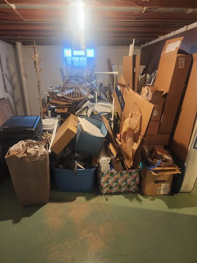 Roll-off dumpster container at job site for Yard Waste Dumpster Rental in Teague